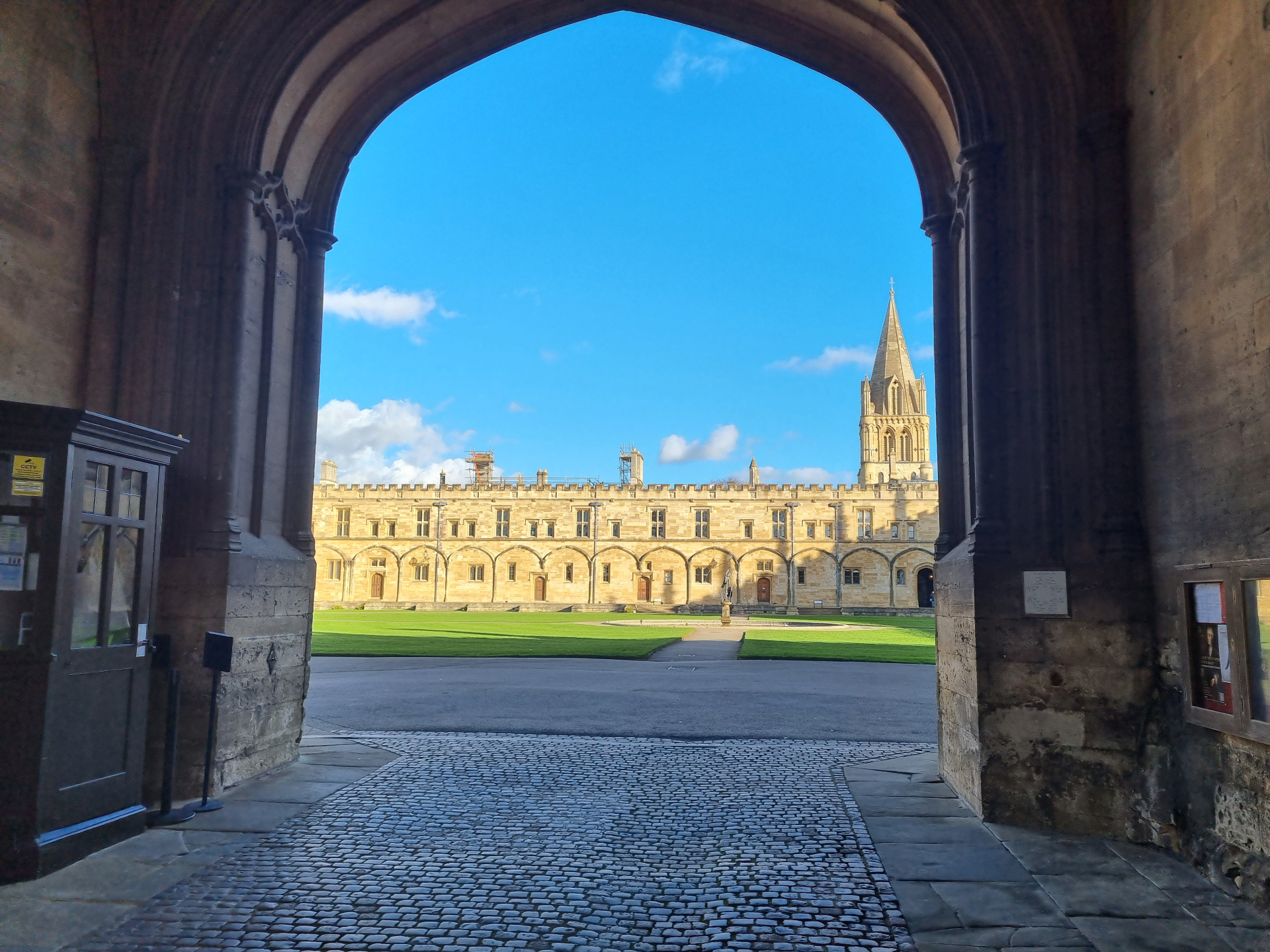 View through a college archway into the courtyard.